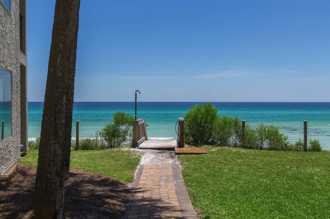 Private beach access path at Blue Mountain Villas with view of the Gulf